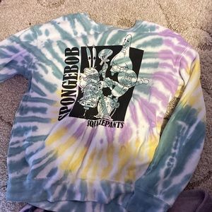 hi guys green and yellow and purple it’s from SpongeBob square pants And size s